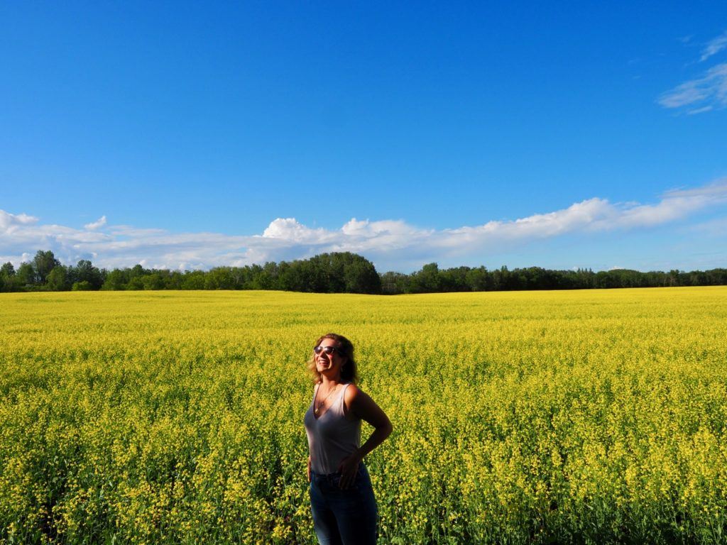 Brenna in canola fields Swan Valley Manitoba